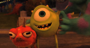 Gif. Monsters University, monsters celebrating at end of film. Sully holding Mike above his head