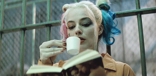 Suicide Squad Harley Quinn drinking tea pinky out and reading gif