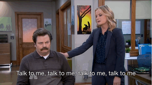 Parks and Recreation Gif. Woman tapping man saying 'Talk to me' four times