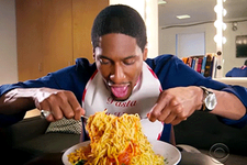 Man eating a big plate of spaghetti