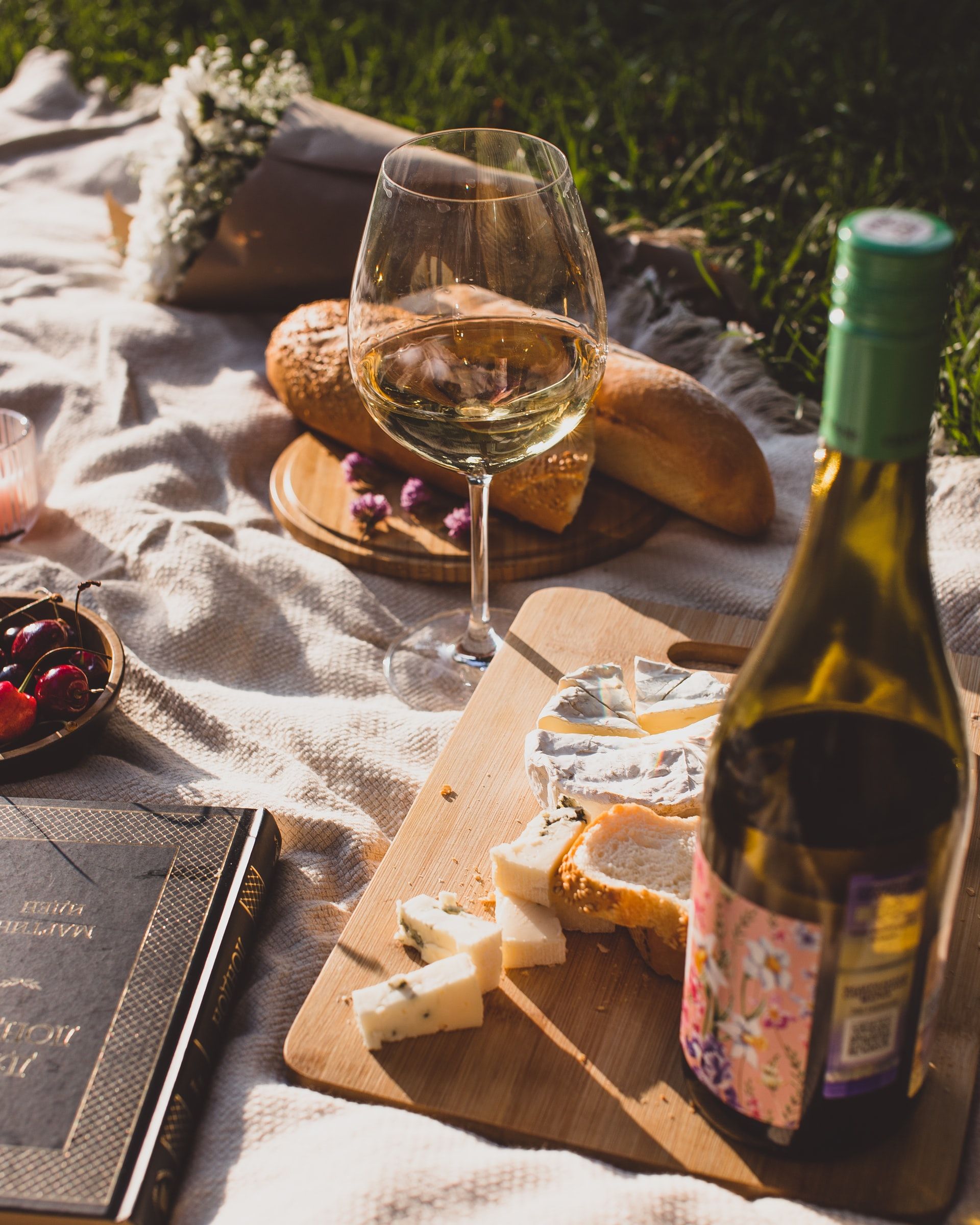 A glass of wine at a picnic
