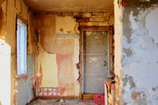 House interior in disrepair, peeling paint