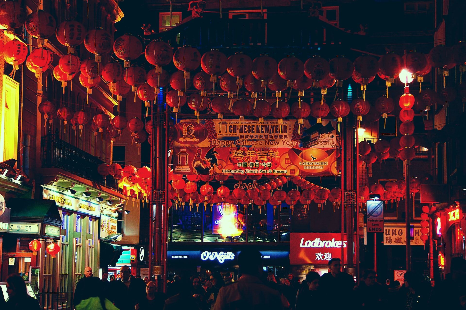 A busy Chinese New Year festival with red paper lanterns everywhere