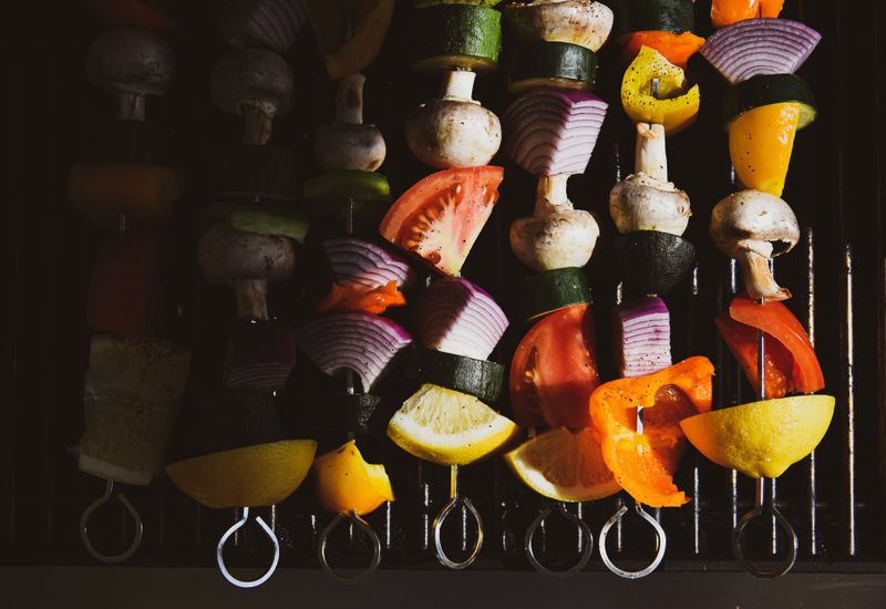 Vegetable kebabs on a grill