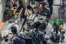 Top down view of baristas serving customers
