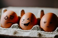 Eggs with different emotions drawn on them