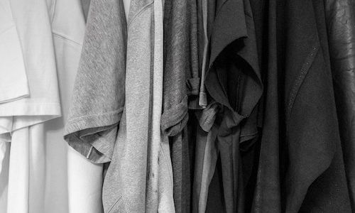 A greyscale photo of assorted clothes.