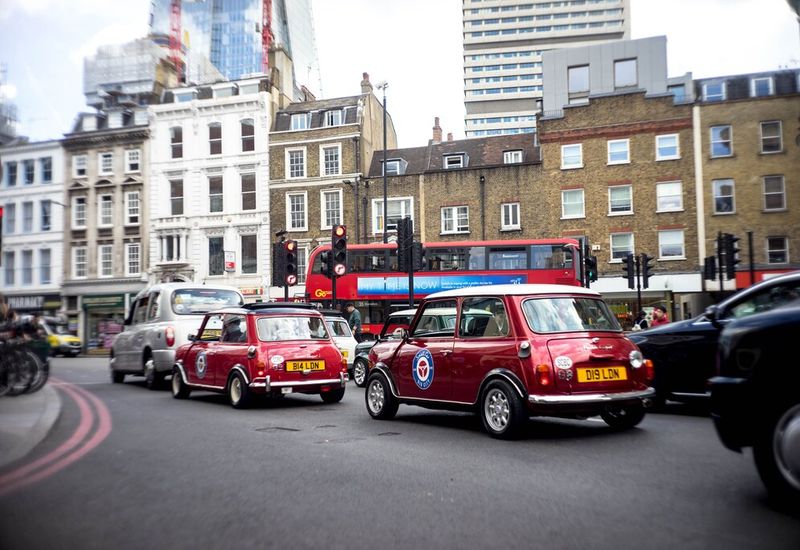 mini coopers driving in London