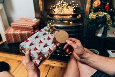 Person receiving a secret Santa gift