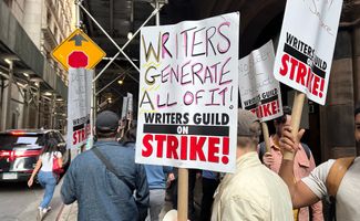 Members of the Writers Guild of America on strike