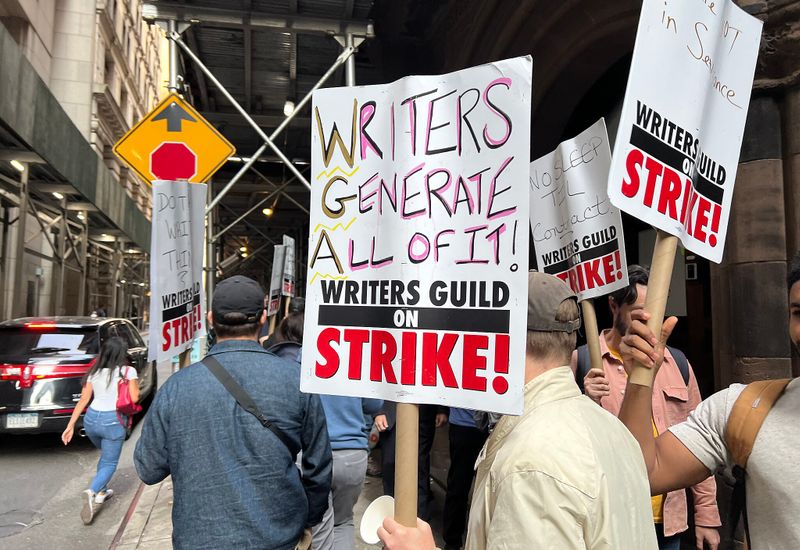Members of the Writers Guild of America on strike